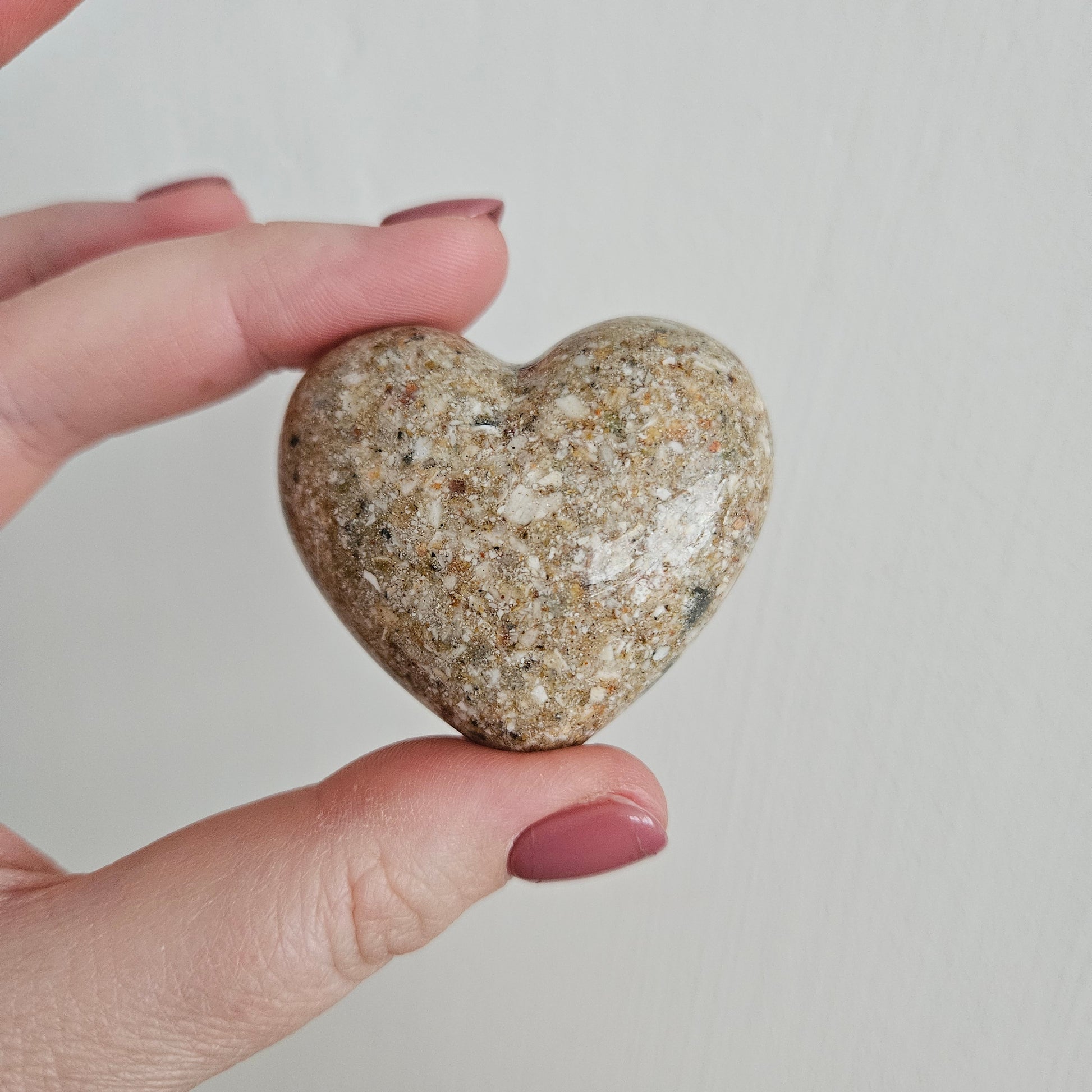 Handgemaakt epoxy hart met geïntegreerde as van een dierbare​